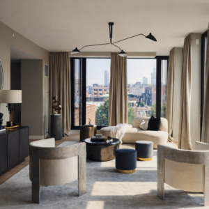 Modern living room interior styling by DreamRose Design at 105 West 29th Street NoMad Manhattan featuring curved sofa and city views